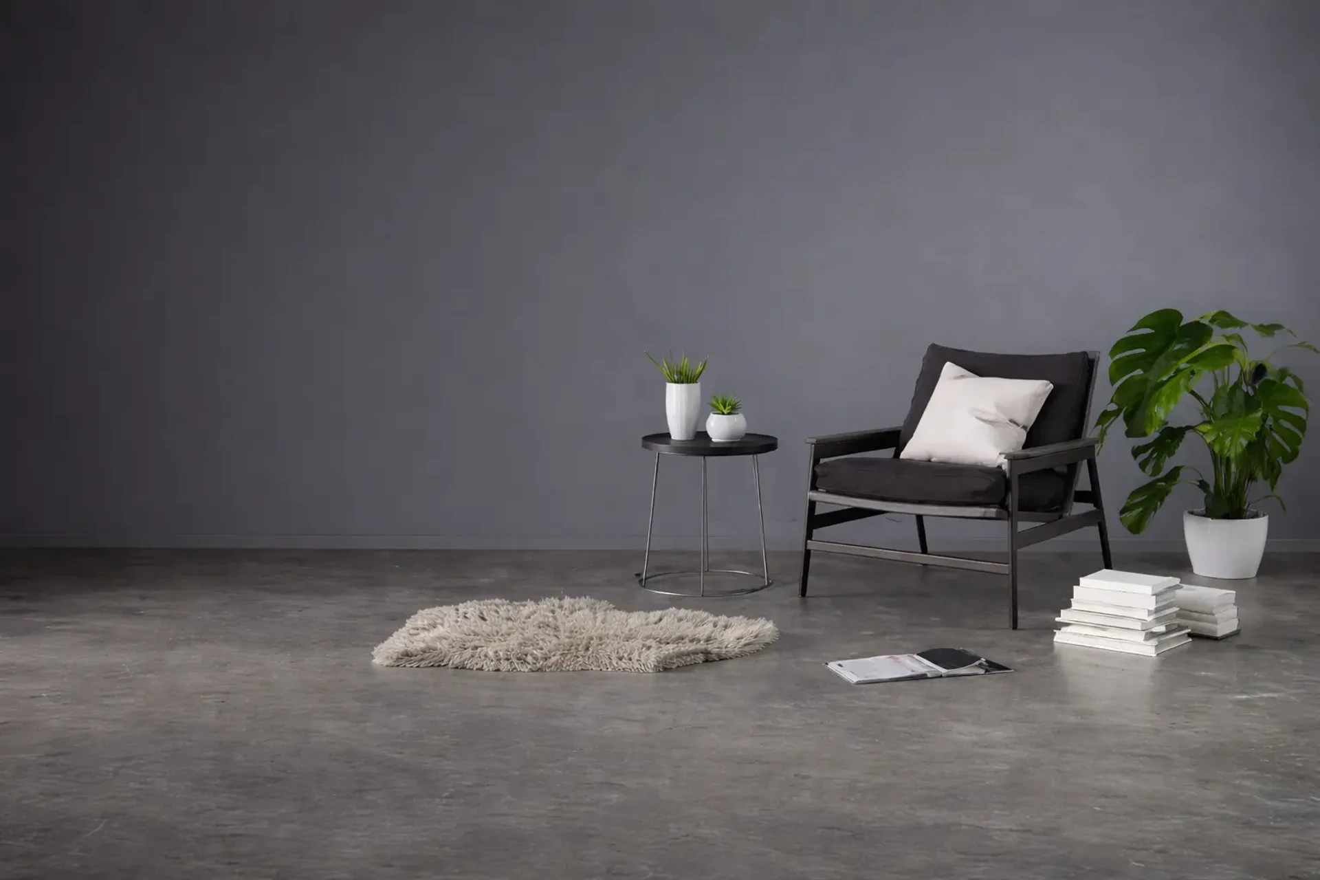 ICreations Interior - Minimalist interior design with designer chair, plants and curated decor